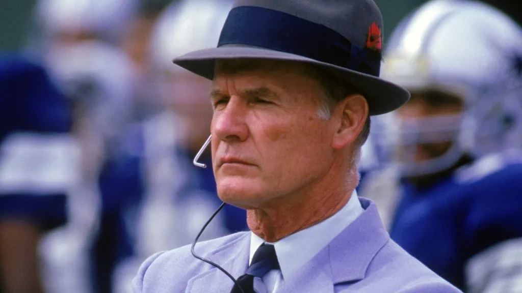Head coach Tom Landry of the Dallas Cowboys watches from the sideline during a game against the San Diego Chargers on November 16, 1986. (Source: Ken Levine/Getty Images)