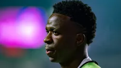 Vinicius Junior of Real Madrid CF seen warming up from the bench during the La Liga EA Sports 2024 25 football match between Rayo Vallecano vs Real Madrid CF.