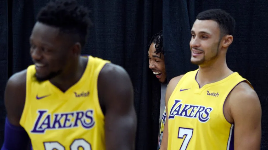 Brandon Ingram #14 of the Los Angeles Lakers makes fun of a teammate while he poses for photographs with Julius Randle #30 Larry Nance Jr. #7 looking on during media day. (Kevork Djansezian/Getty Images)