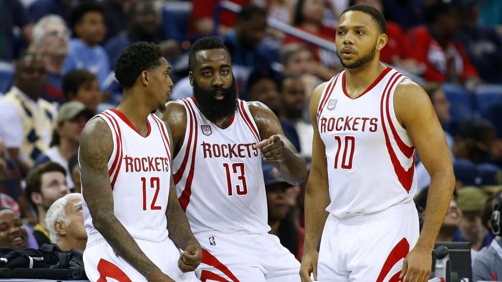 James Harden #13 of the Houston Rockets, Lou Williams #12, and Eric Gordon #10 talk during a game against the New Orleans Pelicans