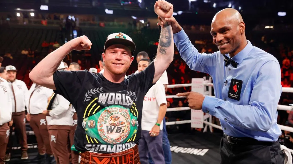 WBC/WBA/WBO super middleweight champion Canelo Alvarez poses for a photo with referee Harvey Dock after Alvarez’s won a title fight by unanimous decision against Edgar Berlanga, not pictured, at T-Mobile Arena on September 14, 2024 in Las Vegas, Nevada. (Photo by Steve Marcus/Getty Images)