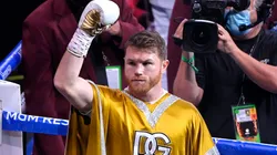 Canelo Alvarez acknowledges the crowd while celebrating after his 11th round technical knock out win of Caleb Plant after their championship bout for Alvarez's WBC, WBO and WBA super middleweight titles and Plant's IBF super middleweight title at MGM Grand Garden Arena.