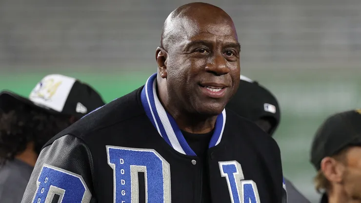 Earvin "Magic" Johnson celebrates with the Los Angeles Dodgers after defeating the New York Yankees during Game Five of the 2024 World Series.