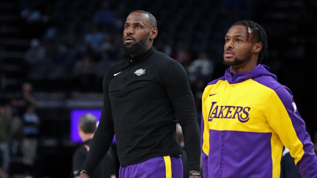LeBron James #23 and Bronny James #9 of the Los Angeles Lakers look on before the game against the Memphis Grizzlies at FedExForum on November 06, 2024 in Memphis, Tennessee. (Photo by Justin Ford/Getty Images)