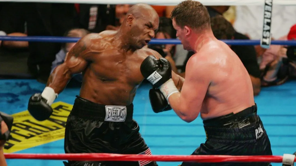 Mike Tyson throws a punch at Kevin McBride during their heavyweight bout on June 11, 2005 at the MCI Center in Washington, DC. McBride was declared winner when Tyson quit after the sixth round. (Photo By Jamie Squire/Getty Images)