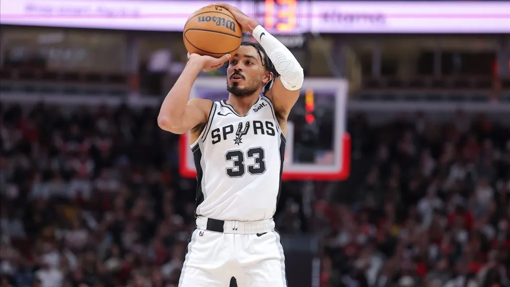 Tre Jones 33 of the San Antonio Spurs shoots the ball during the second half against the Chicago Bulls at the United Center on December, 21, 2023 in Chicago, Illinois.