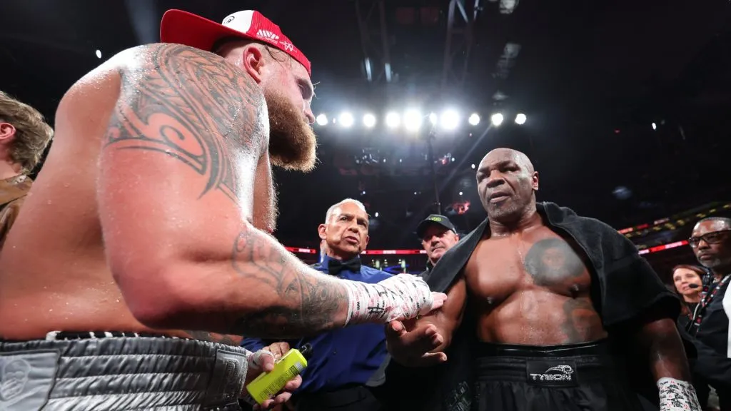 (L-R) Jake Paul announced as winner against Mike Tyson during LIVE On Netflix: Jake Paul vs. Mike Tyson at AT&amp;T Stadium on November 15, 2024 in Arlington, Texas. (Photo by Al Bello/Getty Images for Netflix © 2024)