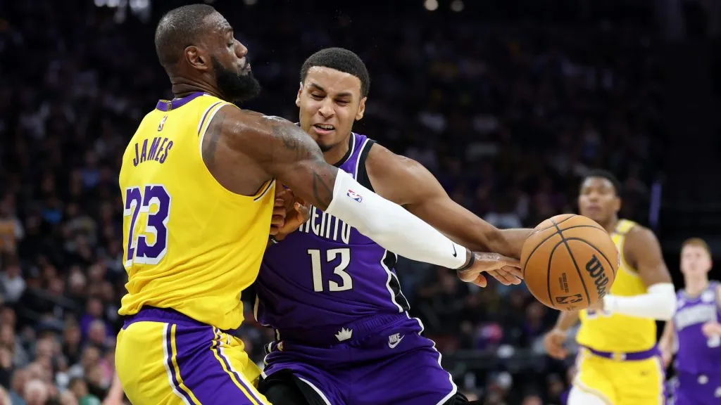Keegan Murray #13 of the Sacramento Kings is guarded by LeBron James #23 of the Los Angeles Lakers in the first half at Golden 1 Center. (Ezra Shaw/Getty Images)