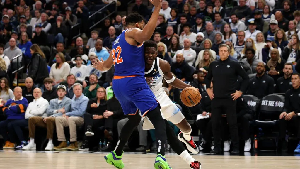 Anthony Edwards #5 of the Minnesota Timberwolves drives to the basket against Karl-Anthony Towns #32 of the New York Knicks in the second quarter at Target Center. (David Berding/Getty Images)