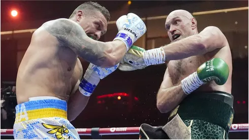 Tyson Fury (right) in action against Oleksandr Usyk (left)