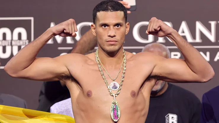 Light heavyweight boxer David Benavidez poses on the scale during an official weigh-in at MGM Grand Garden Arena on June 14, 2024 in Las Vegas, Nevada.