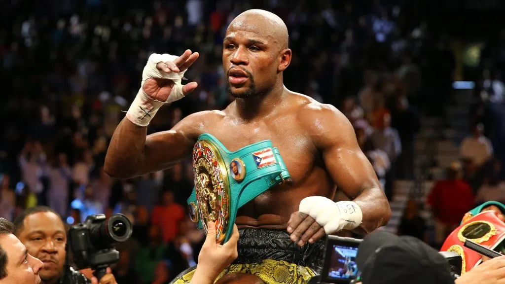 Floyd Mayweather Jr. celebrates his unanimous-decision victory over Robert Guerrero in their WBC welterweight title bout at the MGM Grand Garden Arena on May 4, 2013. (Source: Al Bello/Getty Images)