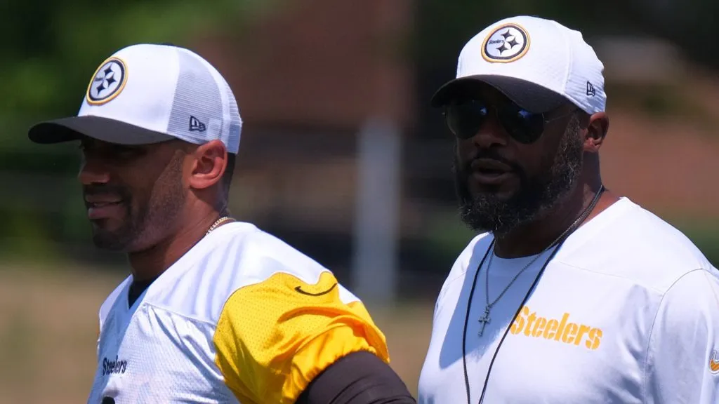 Russell Wilson and Head Coach Mike Tomlin during training camp at Saint Vincent College in Latrobe, PA.