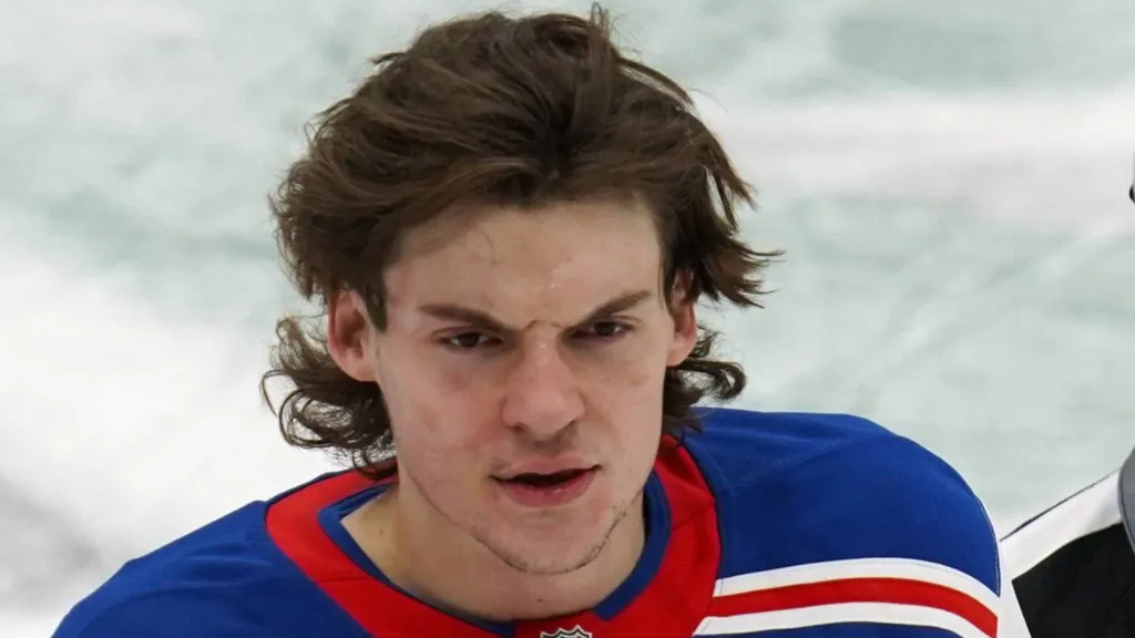 New York center Matt Rempe (73) is taken to the penalty box after elbowing Dallas defender Miro Heiskanen (4) during the National Hockey League game between the Dallas Stars and the New York Rangers played at the American Airlines Center on Friday December 20, 2024.