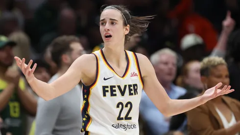 Indiana Fever star Caitlin Clark reacts during a WNBA match