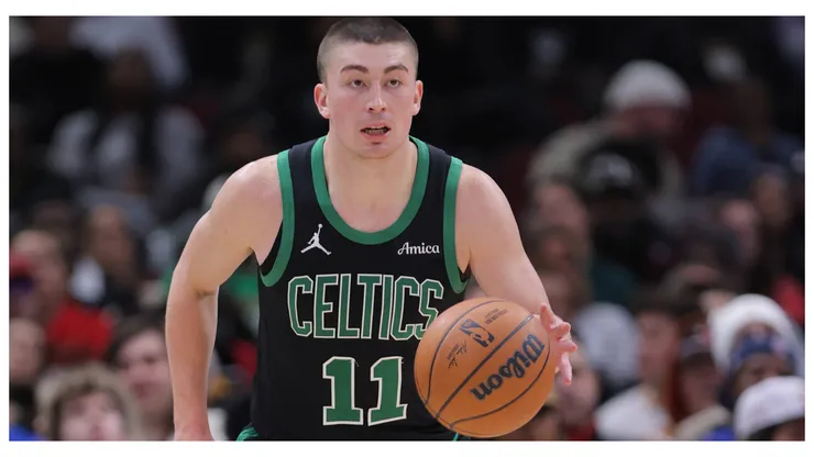 Payton Pritchard 11 of the Boston Celtics brings the ball up court during the second half against the Chicago Bulls on December 21, 2024 at the United Center in Chicago, Illinois.