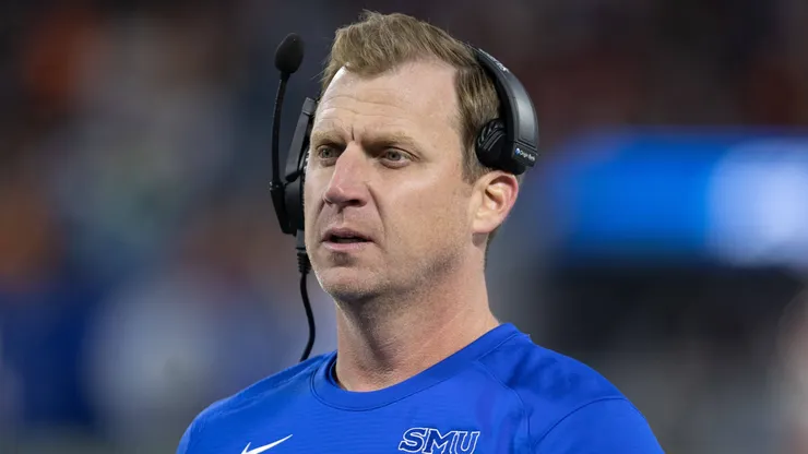 Southern Methodist Mustangs head coach Rhett Lashlee coaches from the sideline during the ACC Championship game between the Clemson Tigers and the SMU Mustangs at Bank of America Stadium in Charlotte, NC.