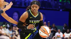 Arike Ogunbowale drives towards the basket during the WNBA