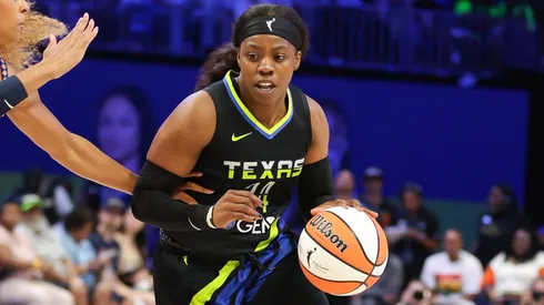 Arike Ogunbowale drives towards the basket during the WNBA