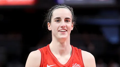 Caitlin Clark of Indiana Fever smiles against the Chicago Sky