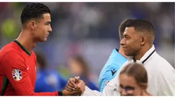Portugal s Cristiano Ronaldo greets Kylian Mbappe of France during a quarterfinal match between Portugal and France at the Euro 2024 soccer tournament in Hamburg, Germany