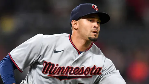Jovani Morán #71 of the Minnesota Twins makes the toss for an out against Amed Rosario of the Cleveland Guardians at first base in the eighth inning of game two of a doubleheader at Progressive Field on June 28, 2022 in Cleveland, Ohio.