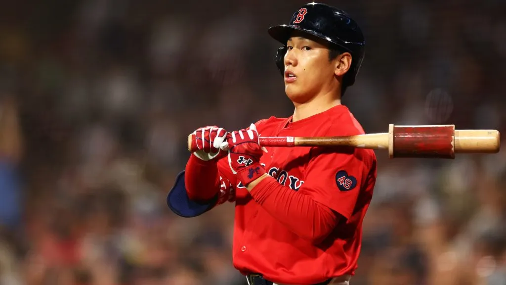 : Masataka Yoshida #7 of the Boston Red Sox warms up in the on deck circle during the second inning against the Tampa Bay Rays at Fenway Park on September 27, 2024 in Boston, Massachusetts. (Photo by Maddie Meyer/Getty Images)