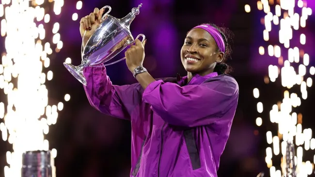 Coco Gauff holds the Billie Jean King Trophy after her three set victory against Qinwen Zheng of China in their Women’s Singles Final match during Day 8 of the 2024 WTA Finals Riyadh. (Source: Clive Brunskill/Getty Images)