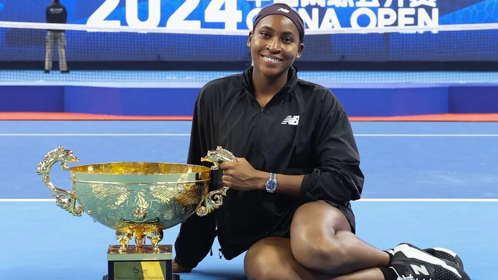 Coco Gauff poses with the winners trophy after winning the Women’s Singles Finals match against Karolina Muchova of the Czech Republic on Day 14 of the China Open. (Source: Lintao Zhang/Getty Images)