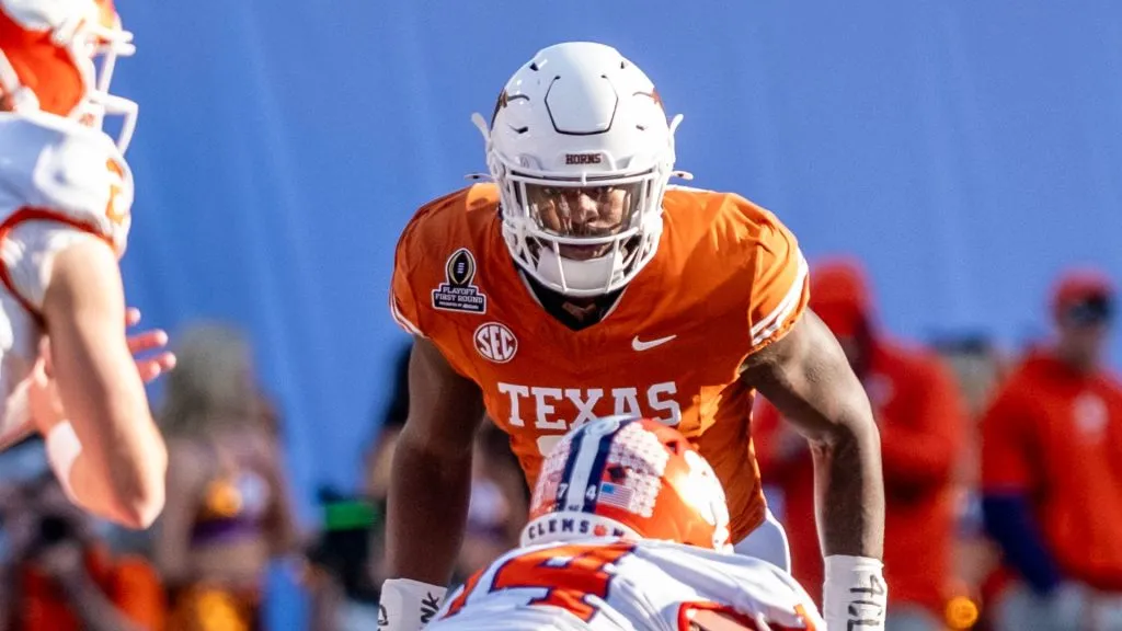 Colin Simmons 11 of the Texas Longhorns in action vs the Clemson Tigers in the first round of the playoffs at DKR-Memorial Stadium.