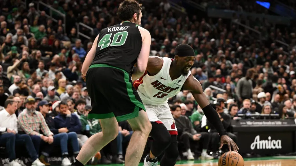 Bam Adebayo #13 of the Miami Heat goes to the basket against Luke Kornet #40 of the Boston Celtics during the second quarter at the TD Garden. (Brian Fluharty/Getty Images)