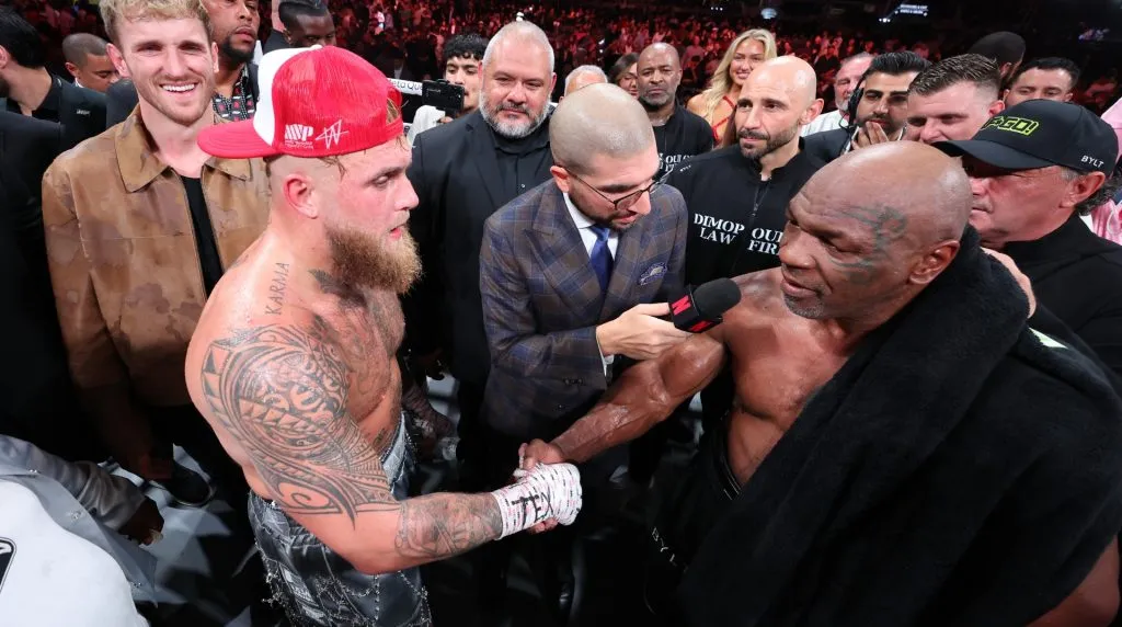 (L-R) Jake Paul announced as winner against Mike Tyson during LIVE On Netflix: Jake Paul vs. Mike Tyson at AT&amp;T Stadium on November 15, 2024 in Arlington, Texas. (Photo by Al Bello/Getty Images for Netflix © 2024)