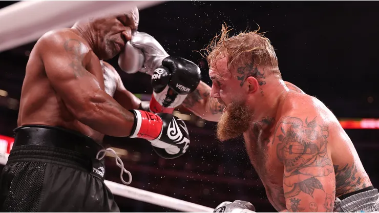 Jake Paul punches Mike Tyson during LIVE On Netflix: Jake Paul vs. Mike Tyson at AT&T Stadium on November 15, 2024 in Arlington, Texas.