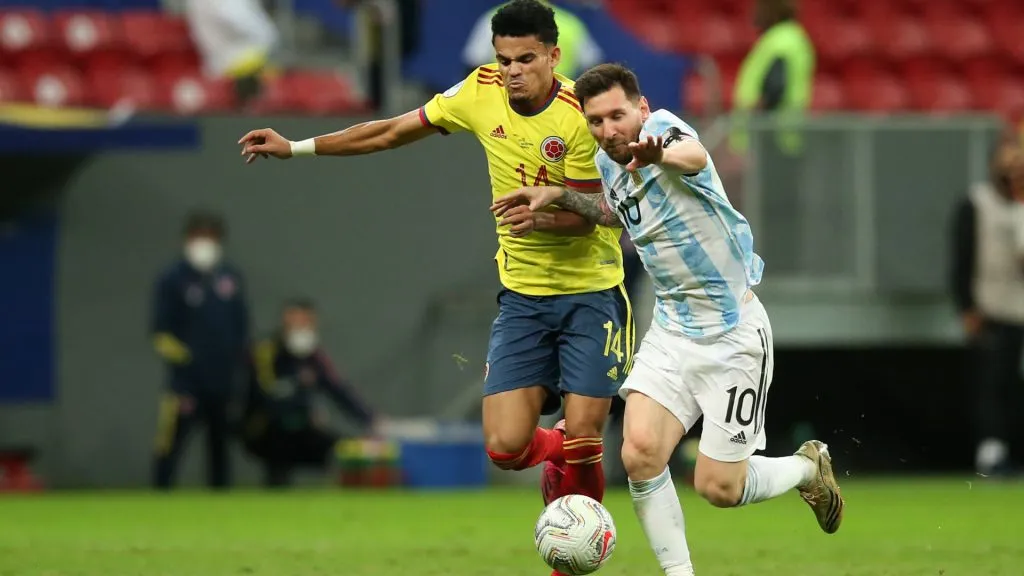 Luis Diaz of Colombia competes for the ball with Lionel Messi of Argentina during a semi-final match of Copa America Brazil 2021 between Argentina and Colombia. (Alexandre Schneider/Getty Images)