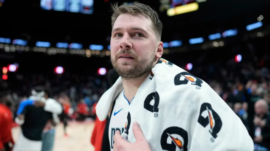Luka Doncic #77 of the Dallas Mavericks walks off the court after the game against the Portland Trail Blazers at Moda Center