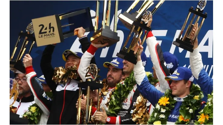 Fernando Alonso, Sebastien Buemi and Kazuki Nakajima celebrate winning the 2019 Le Mans 24 Hour Race