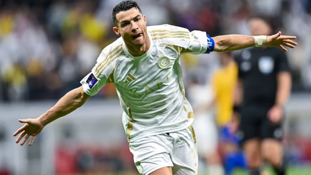 Cristiano Ronaldo celebrates after scoring a goal during the AFC Champions League Elite match between Al Gharafa SC and Al Nassr FC. (IMAGO / Naushad)