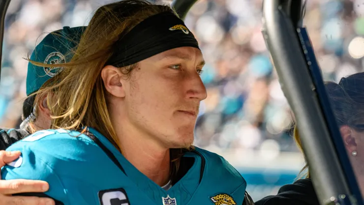 Jacksonville Jaguars quarterback Trevor Lawrence (16) is taken to the lockers after getting injured in the second quarter during a game against the Houston Texans in Jacksonville, FL.