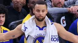 Stephen Curry 30 of the Golden State Warriors reacts to plays from the sidelines during their regular season NBA matchup against the Los Angeles Clippers.