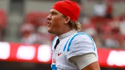 Ole Miss QB Jaxson Dart 2 comes off the bench to congratulate the defense following a defensive touchdown. Ole Miss defeated Arkansas 63-31cin Fayetteville, AR.