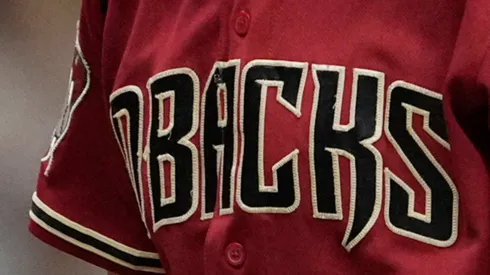 A close-up of Paul Sewald's #38 Arizona Diamondbacks jersey, showcasing the team logo, taken after their 5-2 victory over the Milwaukee Brewers in Game Two of the Wild Card Series at American Family Field on October 4, 2023, in Milwaukee, Wisconsin.