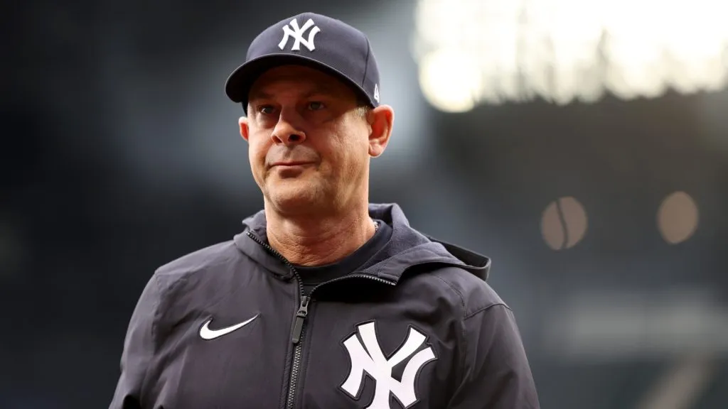 Manager Aaron Boone #17 of the New York Yankees looks on before the game against the Seattle Mariners at T-Mobile Park on May 31, 2023. (Source: Steph Chambers/Getty Images)