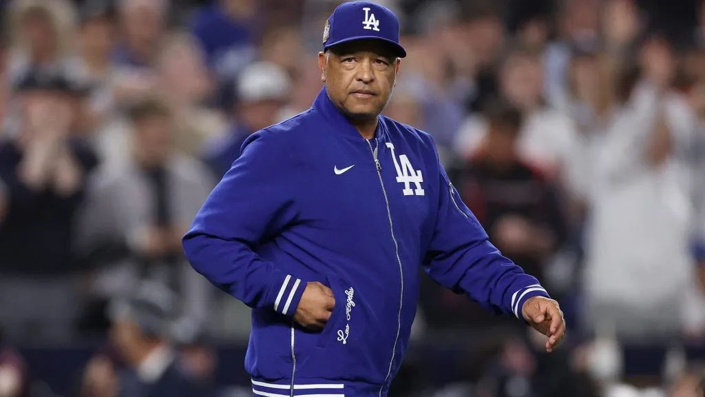 Manager Dave Roberts #30 of the Los Angeles Dodgers walks back to the dugout after relieving starting pitcher Jack Flaherty #0 during the second inning of Game Five of the 2024 World Series. (Source: Elsa/Getty Images)