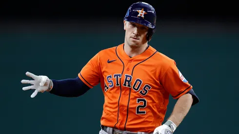 Alex Bregman #2 of the Houston Astros celebrates as he rounds the bases after hitting solo home run against Jordan Montgomery #52 of the Texas Rangers during the first inning in Game Five of the American League Championship Series at Globe Life Field on October 20, 2023 in Arlington, Texas.