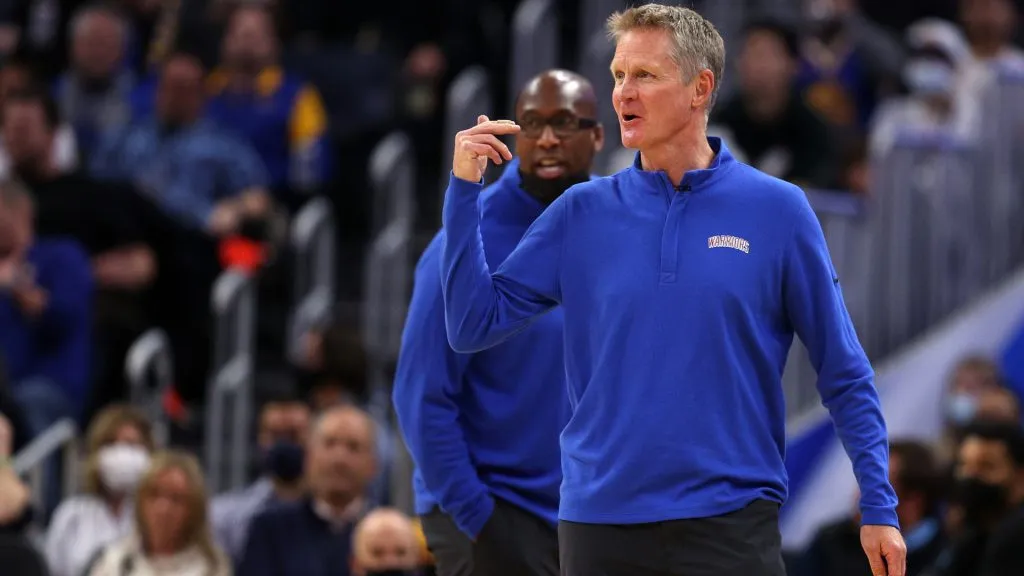 Golden State Warriors head coach Steve Kerr, with assistant coach Mike Brown behind him, gestures to his team during their game against the New Orleans Pelicans at Chase Center. (Ezra Shaw/Getty Images)