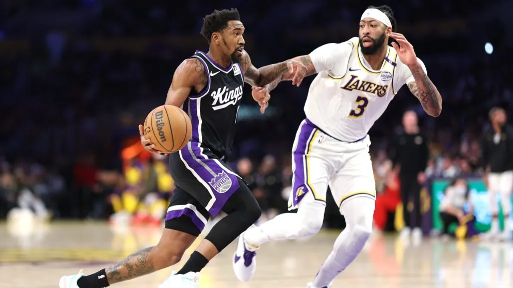 Malik Monk #0 of the Sacramento Kings drives past the defense of Anthony Davis #3 of the Los Angeles Lakers. (Sean M. Haffey/Getty Images)