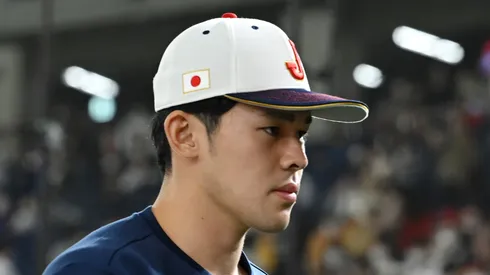 Roki Sasaki #14 of Japan is seen after observing a minute of silence for the victims of the Great East Japan Earthquake on the 12th anniversary prior to the World Baseball Classic Pool B game between Czech Republic and Japan at Tokyo Dome on March 11, 2023 in Tokyo, Japan. Sasaki lost his father and grand parents.