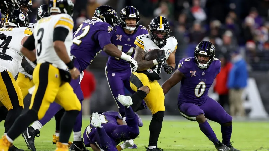Jaylen Warren #30 of the Pittsburgh Steelers is tackled by Roquan Smith #0 of the Baltimore Ravens at M&T Bank Stadium on December 21, 2024. (Source: Rob Carr/Getty Images)