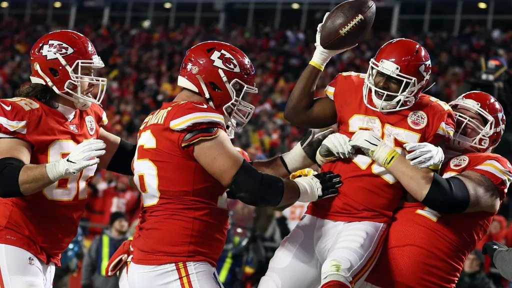 LeSean McCoy #25 of the Kansas City Chiefs celebrates with his teammates after scoring a 3 yard touchdown during the third quarter of the game against the Oakland Raiders in 2019. (Source: Jamie Squire/Getty Images)