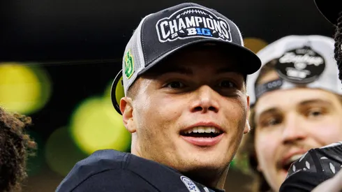 Oregon quarterback Dillon Gabriel (8) during postgame celebration of NCAA, College League, USA football game action between the Penn State Nittany Lions and the Oregon Ducks at Lucas Oil Stadium in Indianapolis, Indiana.